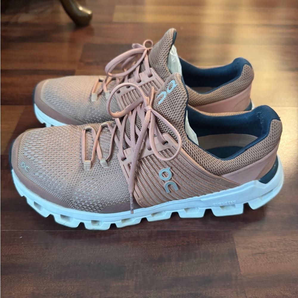 On Running Peach and White Athletic Shoes